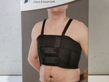 the back of a box with a picture of a man wearing a black bra
