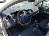 a car that has a steering wheel and a dash board