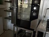 an image of a kitchen with a stove and oven