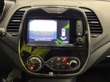 the dashboard of a car with a digital display in the center