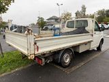 a white truck that is parked on the side of the road