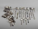 a lot of spoons and spoon spoons on the table