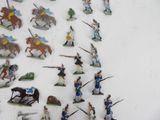 a lot of figurines that are on a table