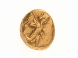 une pièce d'or à l'effigie d'une femme