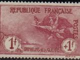 a stamp with a picture of a man on a plane on it