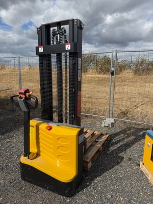 a forklift that is sitting next to a pallet
