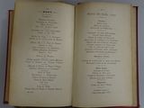 an open book on a table with a menu in it