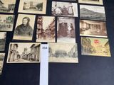 many old photos of people and buildings on the wall