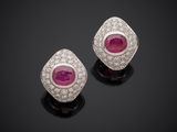 a pair of ruby and diamond earrings