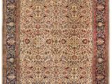 un tapis beige et noir avec une bordure rouge sur fond blanc