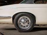 an image of a white car parked in a garage