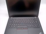 a close up of a laptop computer with a keyboard on a table