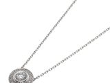 a close up of a necklace with a diamond on a chain