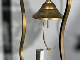 a small candle that is hanging from a light fixture