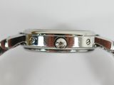 an image of a close up of a watch on a white surface