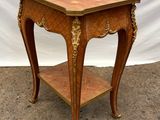 an image of a wooden table with a shelf underneath it