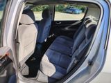 a car that has two seats in the back of it