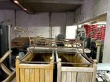 a room with a bunch of wooden crates in it