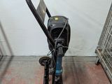 a small machine that is sitting on the floor