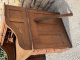 a wooden table with a wine rack on top of it