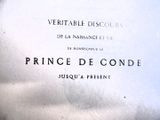 une pancarte sur laquelle est écrit « prince de Condé »