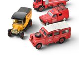 four toy cars that are sitting next to each other