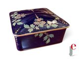 a black box with a floral design on it