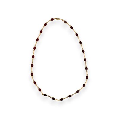 Collier en or jaune 14K (585) à maillons forçat scandés de c…