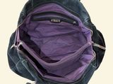 a black purse with purple linings on a white background