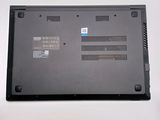 a black laptop with a blue sticker on the back of it