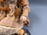 a doll that is sitting on a table