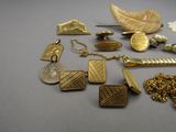 many different types of jewelry on a table
