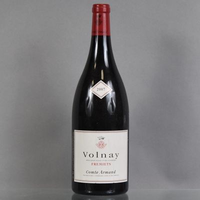 a bottle of wine that is sitting on a table