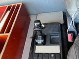 a radio in the back of a car with a remote control