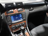the interior of a car with a steering control and a dash board