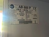 a sign on the door of a building that says ab 600 pce
