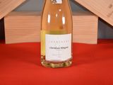 a bottle of wine that is sitting on a table