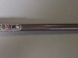 a baseball bat that is sitting on a table