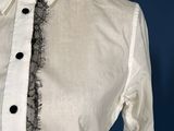 a close up of a shirt and tie on a mannequin mannequin mannequin mannequin mannequin mannequin manne