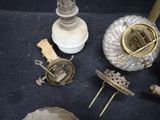 a lot of antique items that are on the floor