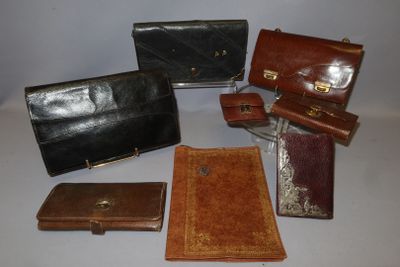 several pieces of leather are arranged on a white surface