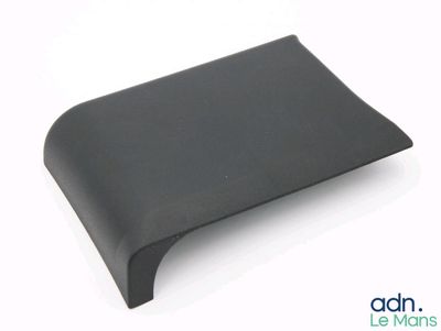 the back of a black leather wallet on a white surface