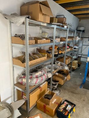 a room with a lot of boxes and boxes on the shelves