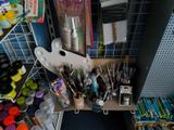 a picture of a cluttered craft room with lots of craft supplies