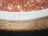 a close up of a painting of a horse on a table