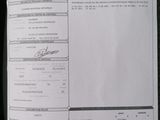 a close up of a paper with a picture of a person ' s name on it