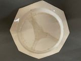 a white plate with a giraffe design on it