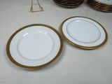 many plates that are sitting on a table
