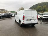 a white van that is parked in a parking lot