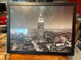 a picture of a picture of a city in a picture frame